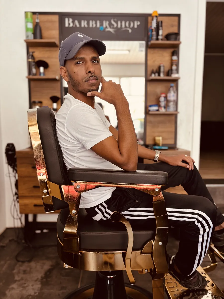 Inhaber im Marathon Barber Shop